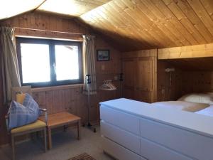 Ein Bett oder Betten in einem Zimmer der Unterkunft CHALET MARESI
