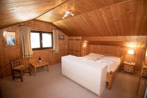 Ein Bett oder Betten in einem Zimmer der Unterkunft CHALET MARESI