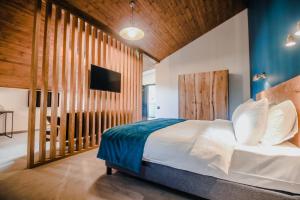Llit o llits en una habitació de Suatis Resort Kazbegi
