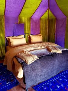 1 camera con letto in tenda di Sahara Nomad Camp a Merzouga