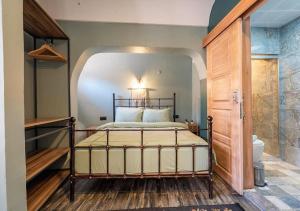 A bed or beds in a room at Liman Deluxe Hotel