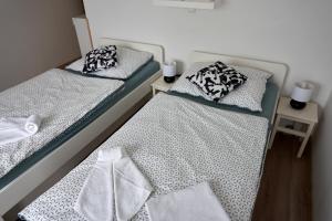 Postel nebo postele na pokoji v ubytování Krejčovství