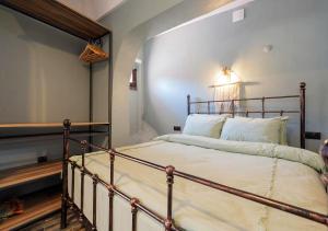 A bed or beds in a room at Liman Deluxe Hotel