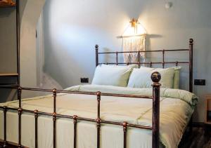 A bed or beds in a room at Liman Deluxe Hotel