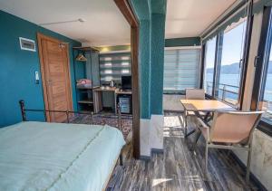 A bed or beds in a room at Liman Deluxe Hotel
