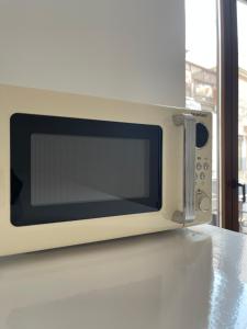 Kuchyň nebo kuchyňský kout v ubytování Carmela Apartment.