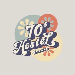 a logo for a restaurant with a number next to flowers at 70's Hostel in Ericeira