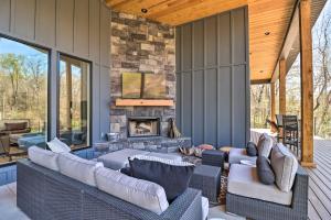 A seating area at Riverfront Heber Springs Home with Dock and Slip!