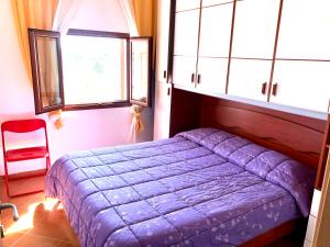 Postel nebo postele na pokoji v ubytování Villa Badessa