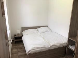 Uma cama ou camas num quarto em Chata Relax
