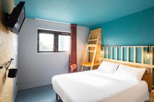 Postel nebo postele na pokoji v ubytování Birgit Hôtel Le Havre Centre