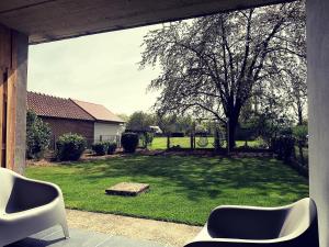 Zahrada ubytování Vakantiewoning Mèzik
