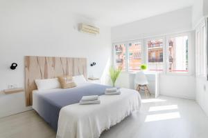 Posteľ alebo postele v izbe v ubytovaní CASA MILA SV guesthouse + 26 fotografií