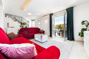 Posezení v ubytování Holiday Home Fradelani