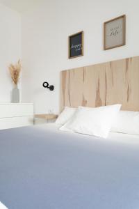 Posteľ alebo postele v izbe v ubytovaní CASA MILA SV guesthouse