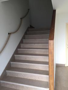 a set of stairs in a house at Studio Cosy in Wissant