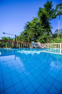 Bazén v ubytování Pousada Canto do Curió Paraty nebo v jeho okolí