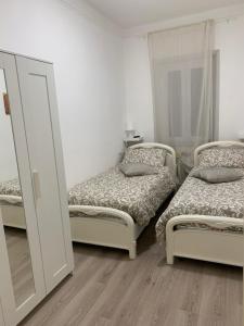 Postel nebo postele na pokoji v ubytování Ca' ToscaLina