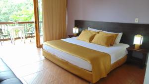 Postel nebo postele na pokoji v ubytování Finca Hotel La Quinta Porra