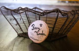 a baseball in a basket with writing on it at Casa Boletus in Castro Laboreiro