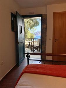 Postel nebo postele na pokoji v ubytování Petra Nova Villas