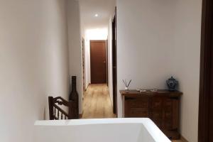 Postel nebo postele na pokoji v ubytování Casa Don Quijote
