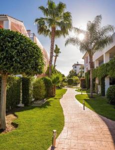 Fotografie z fotogalerie ubytování Lovely 3-bedroom townhouse with shared pool v destinaci Estepona