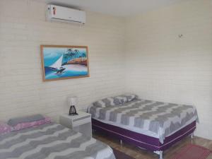 Porto dos Lencóis - Chalé Tipo Apartamento客房内的一张或多张床位