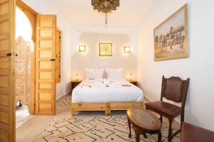 Ліжко або ліжка в номері Riad El Habib