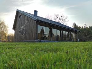 Ogród w obiekcie Na Zakręcie - Domek Loft