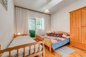 Posteľ alebo postele v izbe v ubytovaní VILLA LEON***
