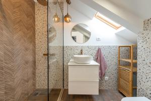 a bathroom with a sink and a shower at Divine Apartment in Mlini +37 photos