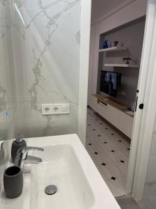 Ванна кімната в Appartement ‘’Los Pinos’’ 50m de la plage