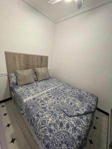 Postel nebo postele na pokoji v ubytování Appartement ‘’Los Pinos’’ 50m de la plage