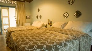 Ένα ή περισσότερα κρεβάτια σε δωμάτιο στο POUSADA LA BELLE D'JOUR - PIPA/RN +43 φωτογραφίες