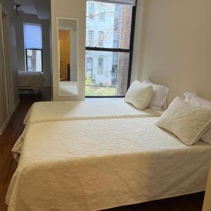 Katil atau katil-katil dalam bilik di Harlem House