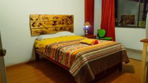 מיטה או מיטות בחדר ב-Kame House hostel