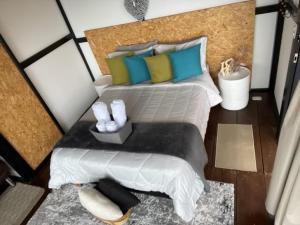 Postel nebo postele na pokoji v ubytování Balú Glamping