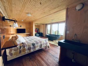 Krevet ili kreveti u jedinici u okviru objekta Altura Hotel