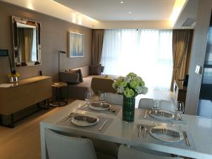 Posezení v ubytování CM Serviced Apartment