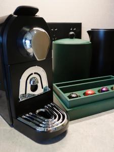 a toy kitchen with a stove and a box of utensils at Melia Chongqing in Chongqing