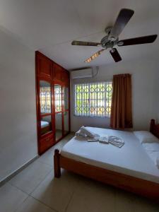 Postel nebo postele na pokoji v ubytování Beau Vallon Villa Self Catering With Pool + 64 fotografií