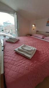 Кровать или кровати в номере Hotel Elisabetta 2 stelle