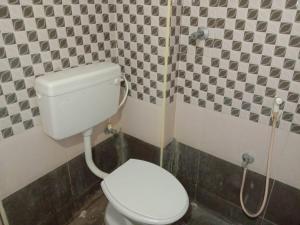 A bathroom at Shubhanga Residency