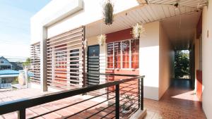 A balcony or terrace at RedDoorz @ FDB Homes Nueva Ecija