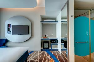 ibis Styles Johor Iskandar Puteri客房内的一张或多张床位