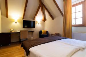 Templomvölgy Butik Hotel Mátrakeresztes房間的床
