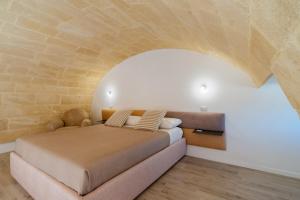 Postel nebo postele na pokoji v ubytování Dimora Fraschi + 38 fotografií