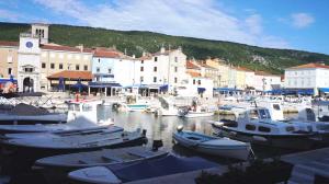 a group of boats are docked in a harbor at Casa Laura Cres in Cres
