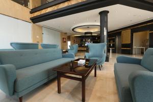 Posezení v ubytování Quiet Dreams - Serviced Apartments King abdul Aziz Street Branch